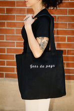 Charger l'image dans la galerie, Tote bag noir - Gens du pays par Mercedes Morin

